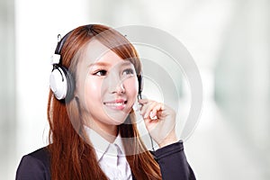 Portrait of happy smiling support phone operator in headset