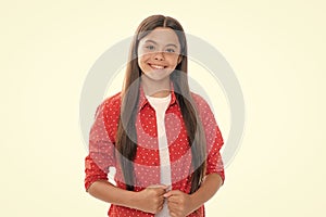 Portrait of happy smiling teenage child girl. Children studio portrait on white background. Childhood lifestyle concept