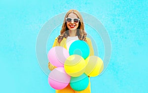 Portrait happy smiling woman holds an air balloons