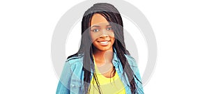 Portrait of happy smiling young african woman with dreadlocks isolated on white background, blank copy space for advertising text