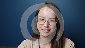 Portrait happy smiling young attractive businesswoman looking at camera successful beautiful at home close up slow