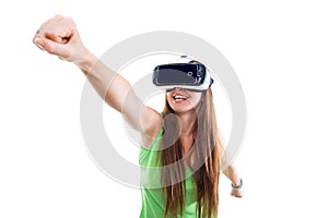 Portrait of happy smiling young beautiful girl getting experience using VR-headset glasses of virtual reality isolated