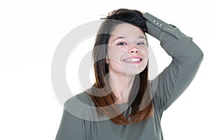 Portrait of happy smiling young beautiful woman, isolated over white background. Looking at camera free copy space for text