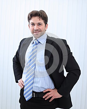 Portrait of happy smiling young businessman