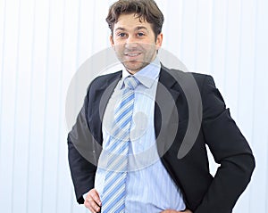 Portrait of happy smiling young businessman