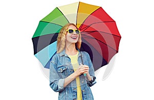 Portrait of happy smiling young woman with colorful umbrella isolated on white background