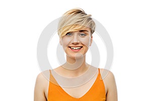 Portrait of happy smiling young woman over white