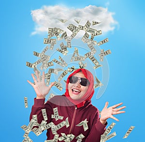 Young Woman Under Rain of Money