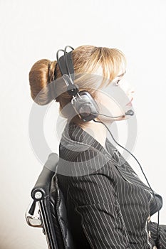 Portrait of happy support phone operator in headset