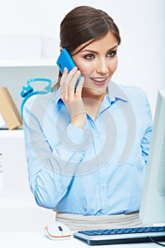 Portrait of happy surprised business woman on phone in white of