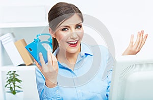 Portrait of happy surprised business woman on phone in white of