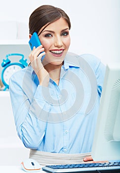 Portrait of happy surprised business woman on phone in white of