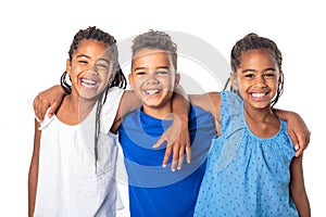 portrait of happy three black childrens, white background