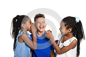 Portrait of happy three black childrens, white background