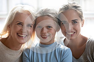 Portrait of happy three generations of women