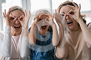 Portrait of happy three generations of women having fun