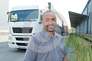 Portrait happy truck driver
