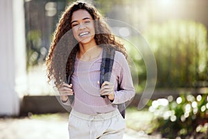 Portrait, happy woman with backpack and student in campus garden, university and education with studying. Excited female