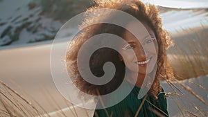 Portrait happy woman desert. Attractive african american girl smiling on camera.