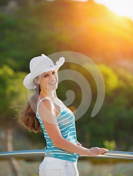 Portrait of happy woman enjoying vacation