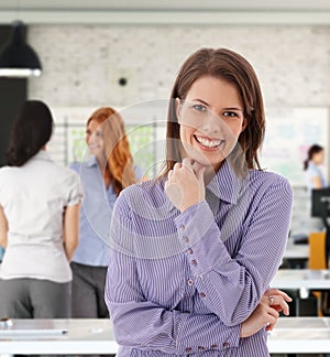 Portrait of happy woman at office