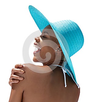 Portrait of happy woman wearing sun hat in hot summer. Seen from behind, with her hand on shoulder, isolated on white background.
