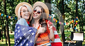 portrait of happy women with american flag