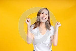 Portrait happy young asian woman dancing music celebrate fun enjoyment relaxation