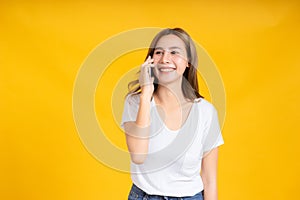 Portrait happy young asian woman talking conversation with smartphone, mobile phone