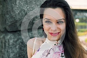 Portrait of happy young beautiful girl close-up, shot of head. A