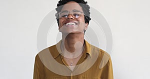 Portrait happy young Black woman look at camera with laughter