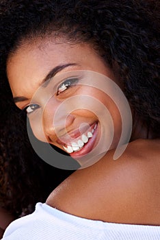 Portrait of happy young black woman smiling