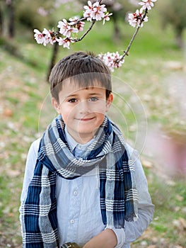 Portrait happy young boy looking at camera with smiling face