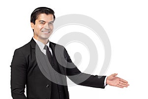 Portrait happy young business man open hand ready to seal a deal. Businessman handshaking isolated on white background