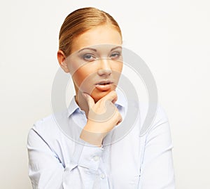 Portrait of happy young business woman over white background