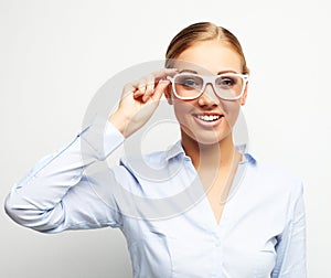 Portrait of happy young business woman over white background