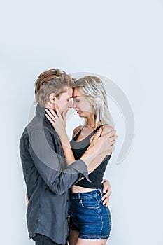 Portrait of happy young couple love together in studio