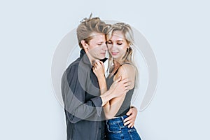 Portrait of happy young couple love together in studio