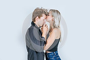 Portrait of happy young couple love together in studio