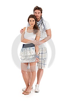 Portrait of happy young couple in summer outfit photo