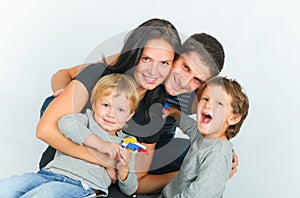 Portrait of happy young family