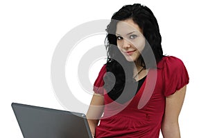 Portrait of a happy young girl with laptop