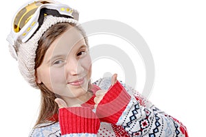 Portrait of a happy young girl snowboarding