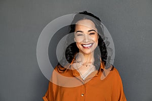 Portrait of happy young hispanic woman smiling