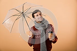 Portrait a happy young man dressed in sweater