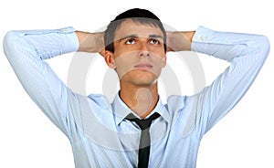 Portrait of a happy young man looking upwards in thought