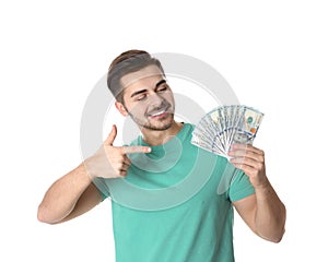 Portrait of happy young man with money on white