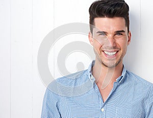 Portrait of a happy young man smiling