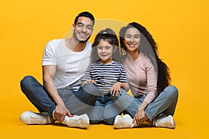 Portrait Of Happy Young Middle Eastern Family Of Three With Little Daughter