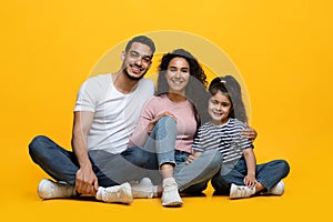 Portrait Of Happy Young Middle Eastern Family Of Three With Little Daughter